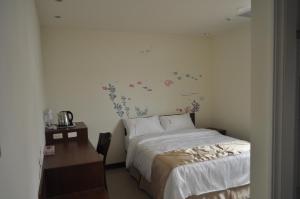 Katil atau katil-katil dalam bilik di Frank B&B