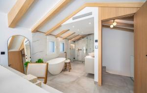 a bathroom with a tub and a sink at Puerto Banus Duplex Lux Selection in Marbella +113 photos
