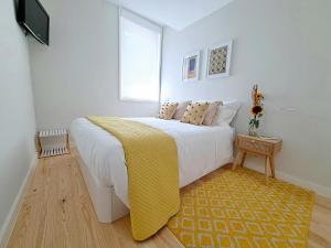 Säng eller sängar i ett rum på Boavista Luxury Villas