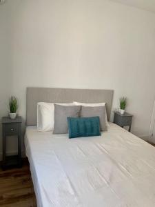 ATICO PASEO DE ALMERÍA房間的床