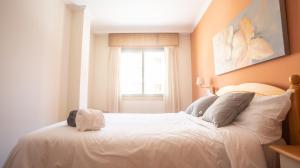 Postel nebo postele na pokoji v ubytování Apartamento en el centro con plaza de garaje