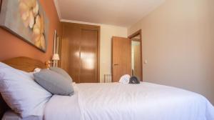 Postel nebo postele na pokoji v ubytování Apartamento en el centro con plaza de garaje