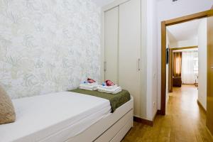 Posteľ alebo postele v izbe v ubytovaní Alcam Gold