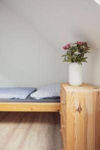 Postel nebo postele na pokoji v ubytování Na Kopečku apartmány