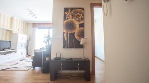 TV a/nebo společenská místnost v ubytování Apartamento en el centro con plaza de garaje