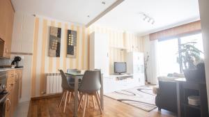 TV a/nebo společenská místnost v ubytování Apartamento en el centro con plaza de garaje