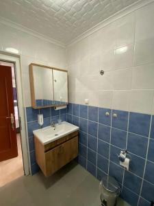 a bathroom with a sink and a mirror at FA&BER Homes in Marmaris +97 photos