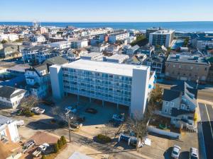 an aerial view of a city with a large building at Trendy 1BD Balcony Pool Small fam or couples stay in Ocean City