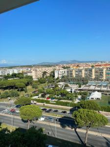 a view of a parking lot with trees and buildings at Exotic Home San Paolo Roma in Rome