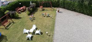 an aerial view of a park with a playground at Kwatery Mielenko Patraj in Mielenko