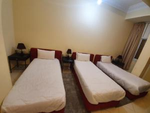 Postel nebo postele na pokoji v ubytování Hotel Achark