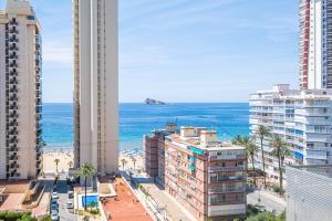 a view of the ocean from a building at Ducado 10-J Apartment Levante Beach in Benidorm