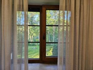 Afbeelding uit fotogalerij van Sodyba Pakrantė in Dituva