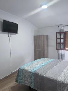 Postel nebo postele na pokoji v ubytování Cantarranas