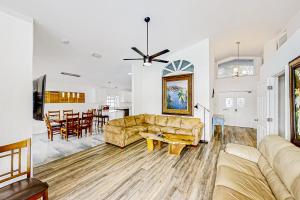 a living room with a couch and a table at Dolphin Court #9 in St. Pete Beach