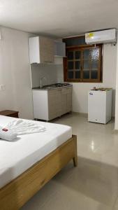 Kuchyň nebo kuchyňský kout v ubytování ApartaHotel Los Naranjos
