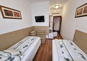 Postel nebo postele na pokoji v ubytování Tang house 唐舍