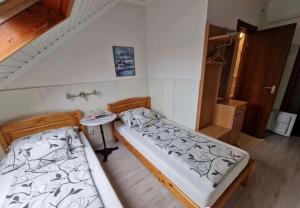 Postel nebo postele na pokoji v ubytování Tang house 唐舍