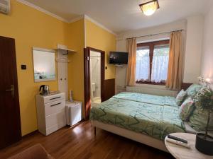 Postel nebo postele na pokoji v ubytování Tang house 唐舍
