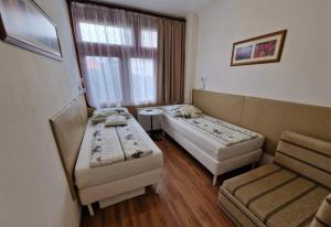 Postel nebo postele na pokoji v ubytování Tang house 唐舍