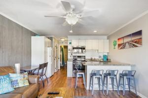 a kitchen and living room with a ceiling fan at Hilton Head Vacation Rental Private Beach Access! in Hilton Head Island