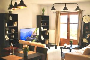 TV a/nebo společenská místnost v ubytování EcoLodge Delmar