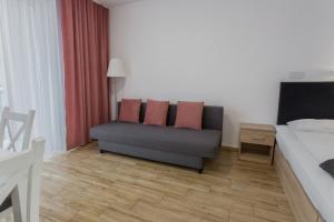 Telewizja i/lub zestaw kina domowego w obiekcie K2 Apartamenty