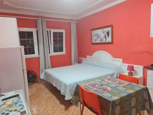 A bed or beds in a room at Vivienda Perez Martin