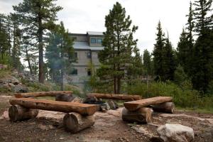 a pile of logs sitting in front of a building at 1601 Lake Purgatory Drive in Durango