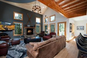a living room with a couch and a fireplace at 1601 Lake Purgatory Drive in Durango