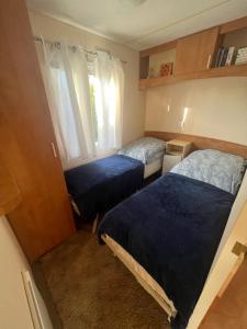 Postel nebo postele na pokoji v ubytování Mandala Mielno Camping