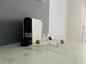 Nápoje v ubytování Superbe Appartement avec vue sur le Lac du Bourget