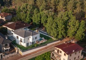 an overhead view of a white house with a roof at Enclave Villa Luxury,Pool and Nature at Marmaris in Marmaris