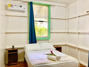 Katil atau katil-katil dalam bilik di Drago Beach House - Private Beach