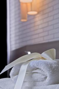 Postel nebo postele na pokoji v ubytování Garni Hotel Eter
