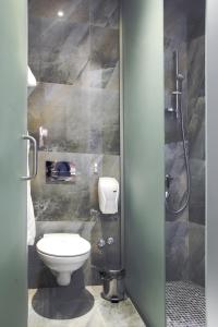Koupelna v ubytování Garni Hotel Eter