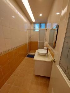 Koupelna v ubytování Xinhe Homestay