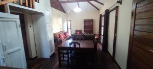 a living room with a table and a couch at Villa Nature in Toliara
