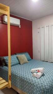 a bedroom with a bunk bed with a ladder at EnjoyMaranhão Santo Amaro in Santo Amaro