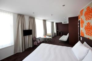 Katil atau katil-katil dalam bilik di Hotel Bella Ciao