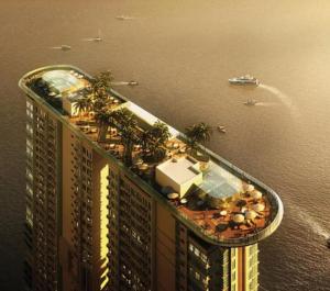 an aerial view of a building with the ocean at Vesta Home @ Silverscape Residence Melaka in Melaka