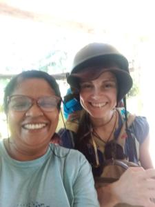 two women are smiling while wearing a helmet at Air Vision 98 in Katunayake