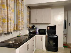 Kuchyň nebo kuchyňský kout v ubytování 1 Bed Flat - Sleeps 2 - Parking - Wifi + 2 fotografie