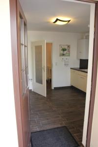 TV a/nebo společenská místnost v ubytování Ferienwohnung "Ernst Schmole" + 13 fotografií