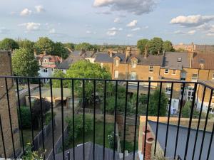 a view of a city from a balcony at London SW Home in London