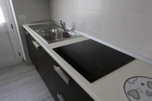 Köök või kööginurk majutusasutuses La Suite del Borgo