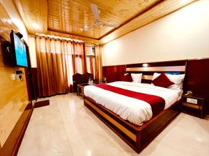 Hotel Amit - 5 Mins Drive to Airport客房内的一张或多张床位