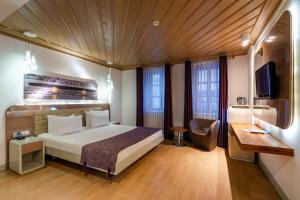 Puding Hotel客房内的一张或多张床位