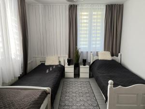 Posteľ alebo postele v izbe v ubytovaní Domek Mazury Pisz