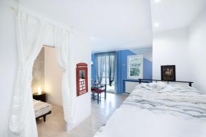 Giường trong phòng chung tại We Home - RICCIONE LOFT Altavilla